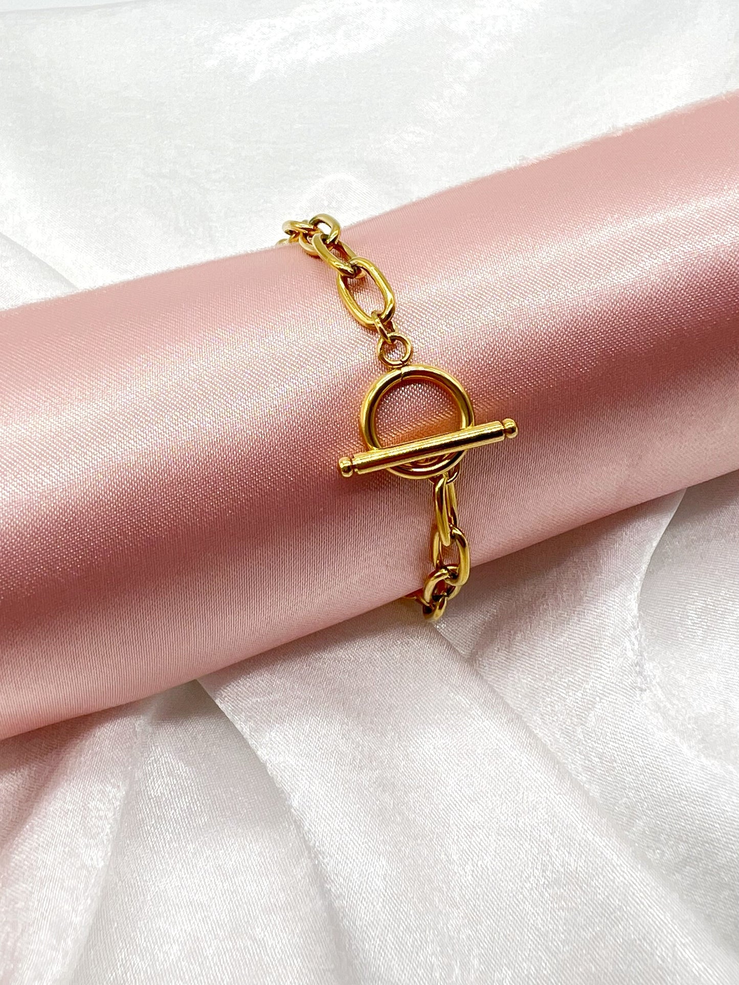 Victoria, our gold bracelet is both elegant and versatile, the perfect accessory for any outfit