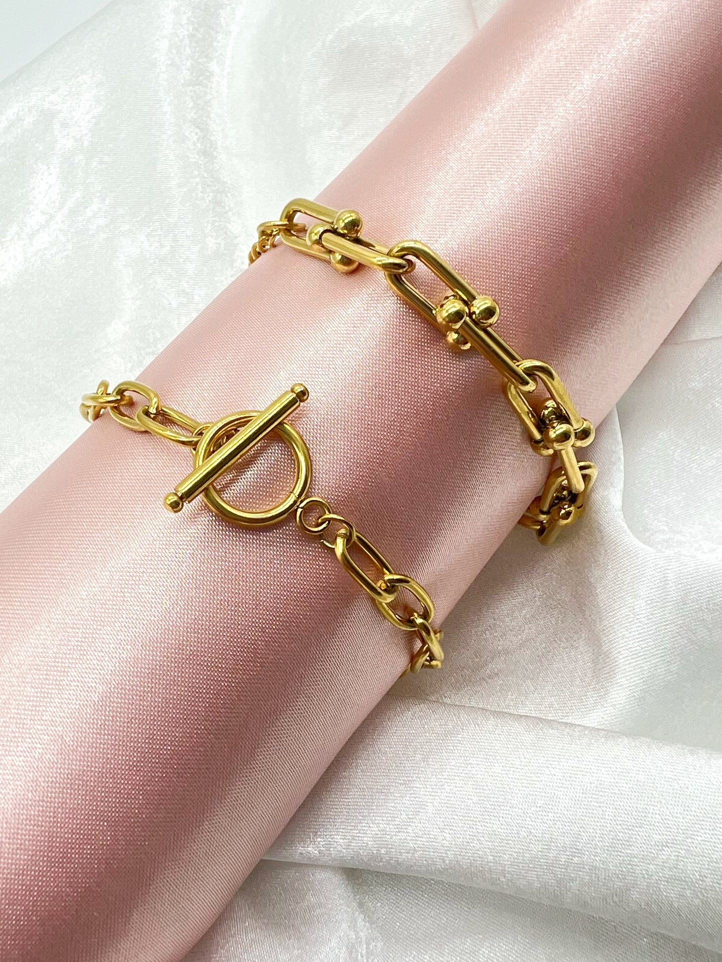 Victoria, our gold bracelet is both elegant and versatile, the perfect accessory for any outfit