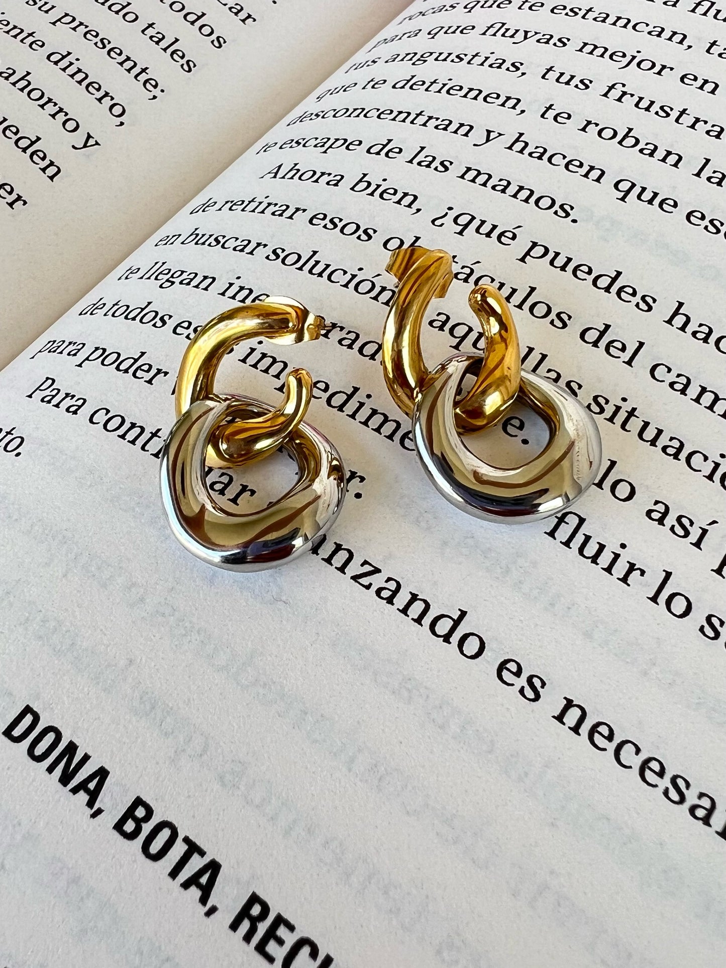 Sandra earrings the combination of gold and silver in these creates a chic and sophisticated look