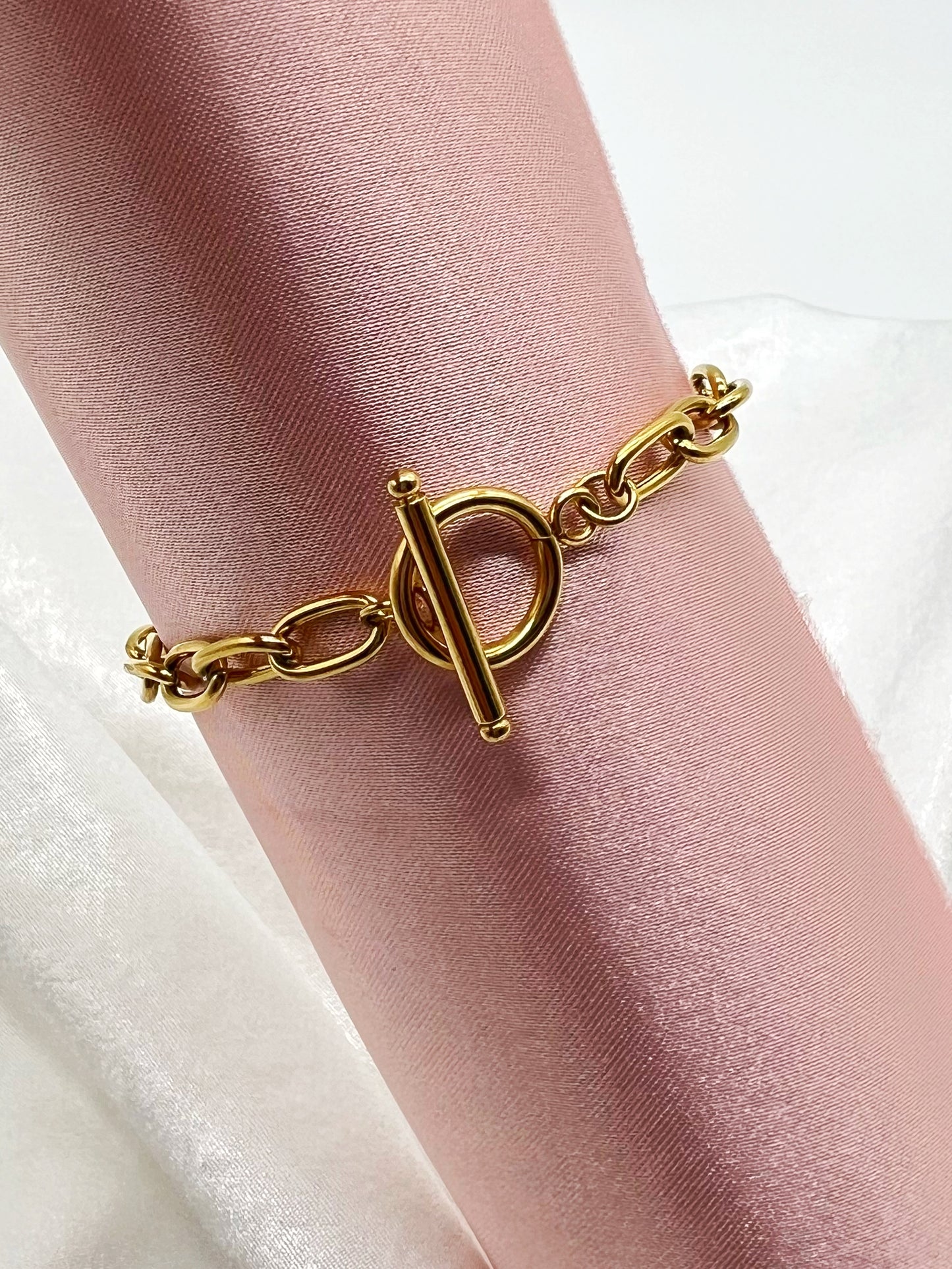 Victoria, our gold bracelet is both elegant and versatile, the perfect accessory for any outfit