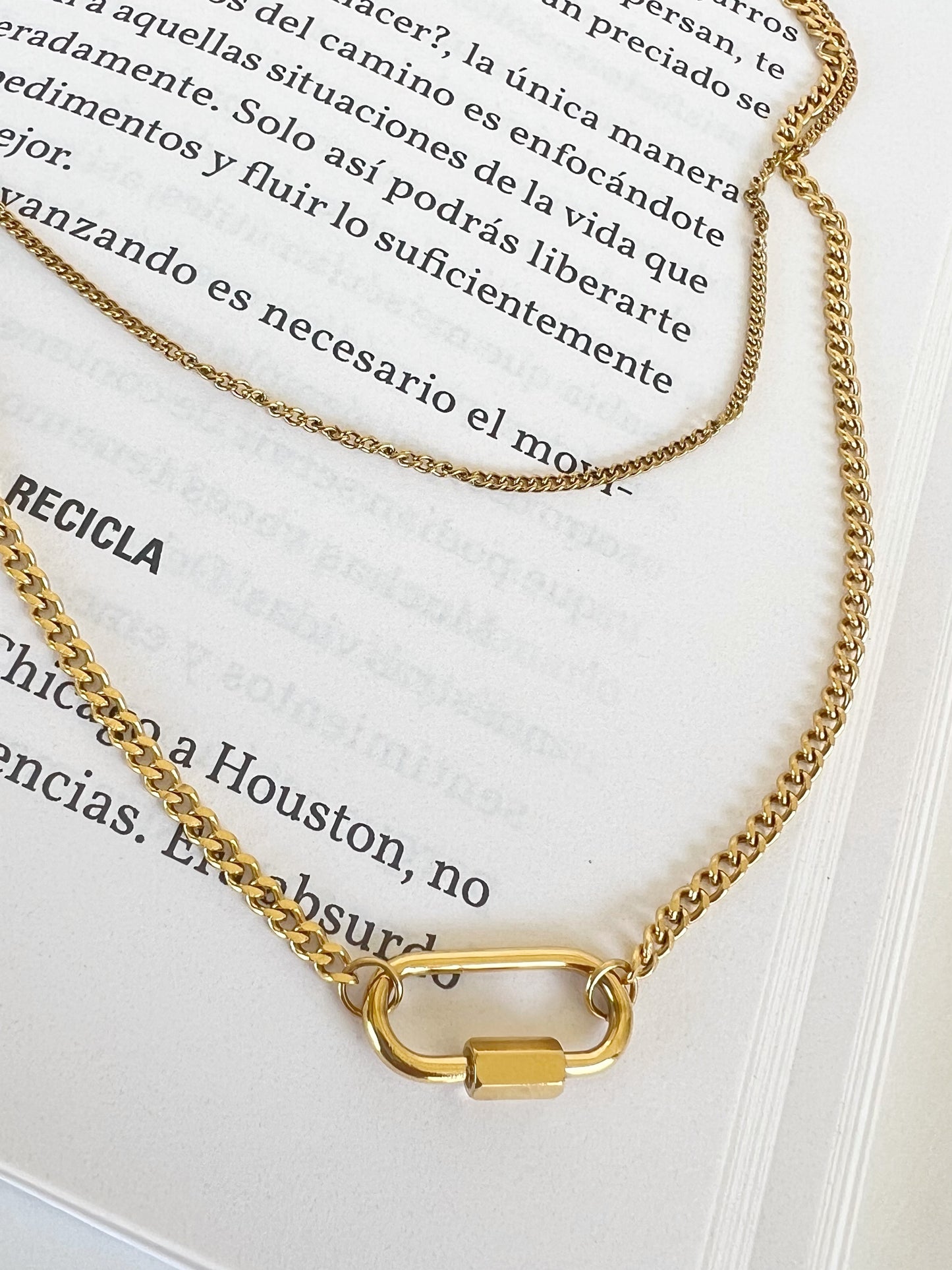 Celeste this exquisite double necklace with a stunning gold- plated charm is the perfect accessory to elevate any outfit